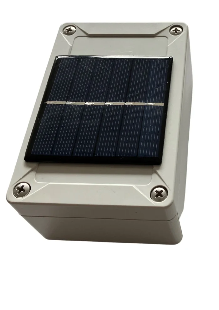 Gateway housing with integrated solar panel on the lid
