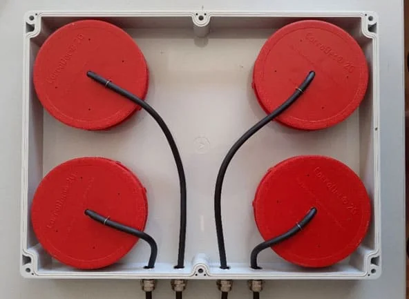 Open gateway housing with four CorroDec 2G sensors and remote antennas